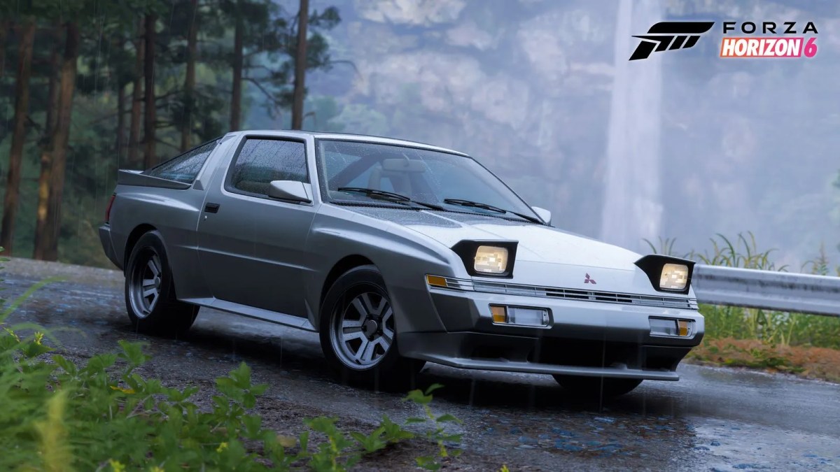 Silver 1988 Mitsubishi car with pop-up headlights parked on a wet forest road near a waterfall in Forza Horizon 6 Series 4 Mascot Party.