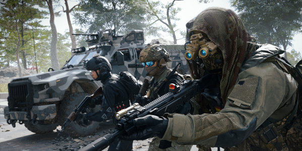 Three custom operators wearing tactical gear and night-vision goggles advance alongside a military vehicle, illustrating loadout options in the Modern Warfare 4 Create-a-Class system.