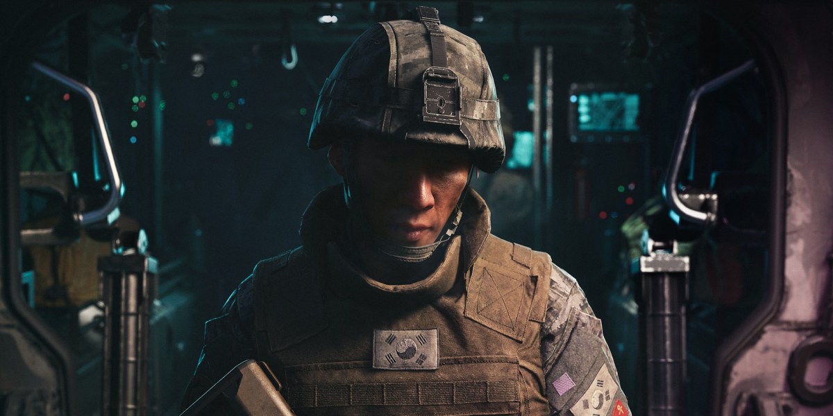 A soldier looking down inside a military vehicle illustrating storage preparation for the estimated GTA 6 file size.